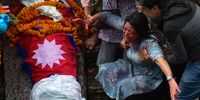 The mother of one of a Gen-Z protester who were shot dead during Last Monday's deadly protest, mourns during a cremation ritual at Pashupatinath Temple on September 16, 2025 in Kathmandu, Nepal. Nepal has been rocked by massive youth-led protests in September 2025, triggered by anger over government corruption, nepotism, and the banning of popular social media platforms, dubbed the "Gen-Z protests". (Photo by Ritesh Shukla/Getty Images)