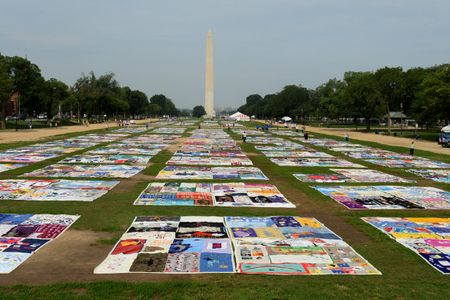 Volunteers turn gigantic AIDS Memorial Quilt fabric into coronavirus masks