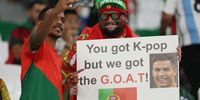 AL RAYYAN, QATAR - DECEMBER 02: Portugal fans enjoy the pre match atmosphere prior to the FIFA World Cup Qatar 2022 Group H match between Korea Republic and Portugal at Education City Stadium on December 02, 2022 in Al Rayyan, Qatar. (Photo by Dean Mouhtaropoulos/Getty Images)