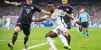 Vinicius Junior of Real Madrid (right) in action against Joshua Kimmich of FC Bayern Munchen at Estadio Santiago Bernabeu. 8 May 8 2024. (Photo: Alberto Gardin/Eurasia Sport Images/Getty Images)