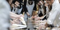 Ultra-Orthodox Jews knead dough at a Matzah bakery in Jerusalem, 03 April 2023. Matzah, or unleavened bread, is used during the week-long Jewish holiday of Passover, commemorating the Jewish exodus from Egypt in Biblical times. Passover will start on 05 April and end on 13 April 2023.  EPA-EFE/ABIR SULTAN