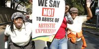 ANC supporters march to the Goodman Gallery in Johannesburg, South Africa on May 29, 2012 in protest of Brett Murray's artwork 'The Spear'. (Photo by Gallo Images / Sowetan / Mohau Mofokeng)
