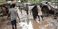Residents walk through flooded streets following a tropical storm in Saint-Louis-du-Sud, Haiti, on Tuesday, Aug. 17, 2021. Tropical Storm Grace swept over Haiti with drenching rains just two days after powerful earthquake battered the impoverished Caribbean nation, reported the Associated Press. Photographer: Jonathan Alpeyrie/Bloomberg via Getty Images