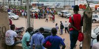 People wait at the port of Pemba for the arrival of their loved ones on a boat carrying 1,200 displaced persons on 1 April 2021. (Photo: EPA-EFE / LUIS MIGUEL FONSECA)