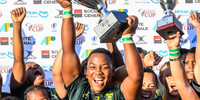 Babalwa Latsha lifts the cup after the Springboks Women's team beat Kenya to qualify for the 2021 Women's Rugby World Cup. Photo: SA RUGBY