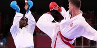 epa09403225 Ivan Kvesic of Croatia (R) and Tareg Hamedi of Saudi Arabia (L) compete in the Men's kumite +75k elimination round of the Karate events of the Tokyo 2020 Olympic Games at the Nippon Budokan arena in Tokyo, Japan, 07 August 2021.  EPA-EFE/HEDAYATULLAH AMID
