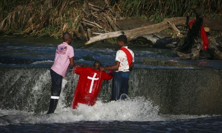 Good Friday - Annual ritual of prayer and cleansing takes place on the Klip River in Ekurhuleni