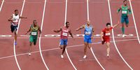 TOKYO, JAPAN - AUGUST 01: Bingtian Su (2R) of Team China wins his Men's 100m Semi-Final on day nine of the Tokyo 2020 Olympic Games at Olympic Stadium on August 01, 2021 in Tokyo, Japan. (Photo by Matthias Hangst/Getty Images)