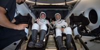In this handout image provided by NASA, NASA astronauts Robert Behnken (L) and Douglas Hurley are seen inside the SpaceX Crew Dragon capsule spacecraft which landed in the Gulf of Mexico after completing the Demo-2 mission to the International Space Station on August 2, 2020 off the coast of Pensacola, Florida. The Demo-2 mission is the first launch with astronauts of the SpaceX Crew Dragon spacecraft and Falcon 9 rocket to the International Space Station as part of the agency's Commercial Crew Program. The test flight serves as an end-to-end demonstration of SpaceXs crew transportation system. Behnken and Hurley launched at 3:22 p.m. EDT on Saturday, May 30, from Launch Complex 39A at the Kennedy Space Center. A new era of human spaceflight is set to begin as American astronauts once again launch on an American rocket from American soil to low-Earth orbit for the first time since the conclusion of the Space Shuttle Program in 2011. (Photo by Bill Ingalls/NASA via Getty Images)