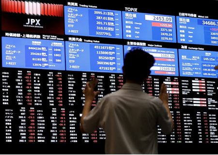 Gold soars, stocks sanguine as investors weigh Trump's latest tariff threat