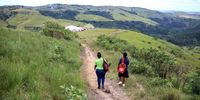 THE LAST MILE: Mentor mothers Bukiwe Mpaceka and Nosipho Mbava walking in Luqoqweni village to visit a family. (Photo: Oupa Nkosi)