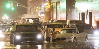 epa09442161 Cars stuck on a street flooded by heavy rain as remnants of Hurricane Ida hit the area in the Queens borough of New York, New York, USA, 01 September 2021.  EPA-EFE/JUSTIN LANE