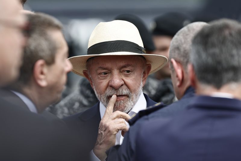 Lula and Bolsonaro launch campaigns as polls show race near tie ahead of October election
