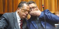 SAFA President and his co-accused Trevor Neething appear at Palm Ridge Magistrate's Court on November 13, 2024 in Palm Ridge, South Africa. It is reported that Jordaan faces charges of fraud and theft amounting to R1.3 million. (Photo by Gallo Images/Sharon Seretlo)