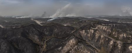 Grand Canyon fire that was left to burn swells 50% after destroying historic lodge