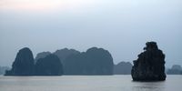 Dusk falls on Ha Long Bay, Vietnam, October 2016. Photographer:  David Bass