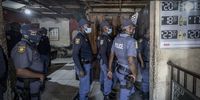 Police raid a shebeen on 7 April 2022 after the announcement of the deployment of more boots on the ground in Diepsloot. (Photo: Shiraaz Mohamed)