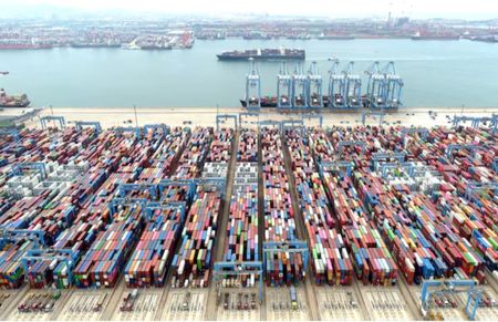 China exports accelerate amid trade tensions, imports surprise