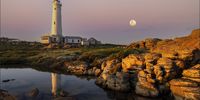 Cape St Francis Lighthouse at sunset.