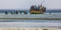 Passengers and cargo board a boat from a fishermen's beach that has become one of the main arrival points for displaced persons fleeing from armed violence raging in the province of Cabo Delgado, in the Paquitequete district of Pemba, northern Mozambique, 21 July 2020. Radical Islamist militant groups seeking to establish an Islamic state in the region, such as Ansar al-Sunna, have claimed responsibility for some of these attacks over the past year. The insurgent groups had taken control of strategic villages dotting the coast of the northern Cabo Delgado province – which are located more than 100 kilometers (62 miles) from the provincial capital, Pemba – for several days before they were driven out by troops belonging to the  Mozambique Defense Armed Forces (FADM).  (Photo: EPA-EFE / RICARDO FRANCO)