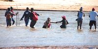 Some residents prefer to cross the uMlazi River on foot as they cannot afford  to pay  for the boat trip. (Photo: Phumlani Thabethe)