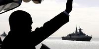 South African President Thabo Mbeki (L) waves to the fleet onboard the South African Navy vessel SAS Protea during the Presidential Fleet Review in Simonstown, South Africa 05 September 2008. EPA/NIC BOTHMA