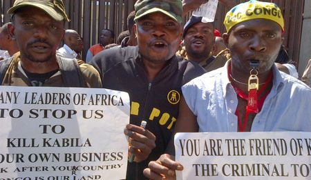 Congolese rebels in Pretoria court, as Congolese rebel outside the court