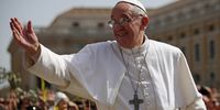 Pope Francis waves to the crowds during a drive around St. Peter's Square after delivering his blessing to the palms and to the faithful gathered in St. Peter's Square during Palm Sunday Mass on March 24, 2013 in Vatican City, Vatican.  (Photo by Dan Kitwood/Getty Images)