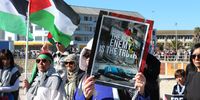 The march along Sea Point Promenade, Cape Town, follows the killing of Al Jazeera correspondent Anas al-Sharif and five of his colleagues in an Israeli airstrike in Gaza on Sunday, 10 August. (Photo: Tamsin Metelerkamp)