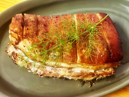 Pork belly and crackling with red grapes and fennel