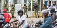 epa11620830 Members of the security forces stand guard after preventing a banned opposition rally from taking place in Dar es Salaam, Tanzania, 23 September 2024. Tanzanian police arrested supporters of the main opposition party Chadema for participating in a banned protest to demand an end to alleged political abductions and killings. According to police, 14 people were arrested, including Chadema party chairman Freeman Mbowe and vice-chairman Tundu Lissu, for defying a prohibition on the protests. Leaders of the opposition have accused Tanzanian President Samia Suluhu Hassan of cracking down on democracy ahead of elections in November 2024 and in 2025.  EPA-EFE/ANTHONY SIAME