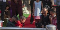 Children are seen crying at the Klipsruit Cemetary, where the body of Nathaniel Julies was laid to rest. (Photo: Shiraaz Mohamed)