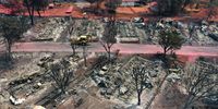 CLEARLAKE, CALIFORNIA - AUGUST 19: In an aerial view, burned mobile homes are visible at the Creekside Mobile Home Park a day after being destroyed by the Cache Fire on August 19, 2021 in Clearlake, California. The fast moving Cache Fire destroyed dozens of homes on Wednesday afternoon and charred over 80 acres. The fire is 30 percent contained. (Photo by Justin Sullivan/Getty Images)