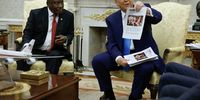 US President Donald Trump holds up a printed article from American Thinker while accusing South Africa President Cyril Ramaphosa of state-sanctioned violence against white farmers in South Africa, during their Oval Office meeting at the White House on 21 May 2025. (Photo: Chip Somodevilla / Getty Images)