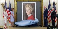 WASHINGTON, DC - JUNE 06: (L-R) First Lady Jill Biden, Anne Peterson, Nancy Reagan’s niece, Fred Ryan, Chairman of the Board of Trustees of The Ronald Reagan Presidential Foundation and Institute and Louis DeJoy, U.S. Postal Service Postmaster General, unveil the Nancy Regan stamp, in the East Room at the White House on June 06, 2022 in Washington, DC. The U.S. Postal Service unveiled the stamp honoring the legacy of First Lady Nancy Reagan and her role in helping to shape President Ronald Regan's Administration. (Photo by Kevin Dietsch/Getty Images)
