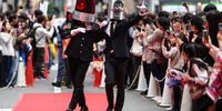 Participants walk through a street during the parade as part of The Ikebukuro Halloween Cosplay Festival 2024 Powered by dwango on October 26, 2024 in Tokyo, Japan. The Ikebukuro Halloween Cosplay Festival, one of Japan's largest cosplay events, will take place from October 25 to October 27, 2024, attracting thousands of participants and fans to the vibrant streets of Ikebukuro. As cosplayers showcase their creativity and passion, the festival promises a lively atmosphere filled with costumes, performances, and community engagement. (Photo by Takashi Aoyama/Getty Images)