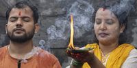 A Nepalese devotee woman prays to Lord Shiva during the first day of the Sarwan Brata festival, which is observed through prayer and a month of fasting, at the Pashupati Temple in Kathmandu, Nepal, 22 July 2024. Married and single Nepalese Hindu women gathered in temples on each Monday of the Sawan month, spanning from 22 July to 12 August, to pray for a long and prosperous life of their husbands or for a chance to find a good one. The fasting is undertaken every Monday exclusively by women worshipping Lord Shiva.  EPA-EFE/NARENDRA SHRESTHA