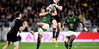 Cheslin Kolbe of South Africa and Beauden Barrett of New Zealand compete for the ball during The Rugby Championship match between New Zealand All Blacks and South Africa Springboks at Sky Stadium on September 13, 2025 in Wellington, New Zealand. (Photo by Joe Allison/Getty Images)