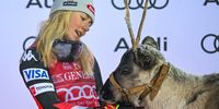 Mikaela Shiffrin of United States with a reindeer after winning in the Women’s Slalom race at the FIS Ski World Cup in Levi, Finland, 12 November 2023  EPA-EFE/KIMMO BRANDT