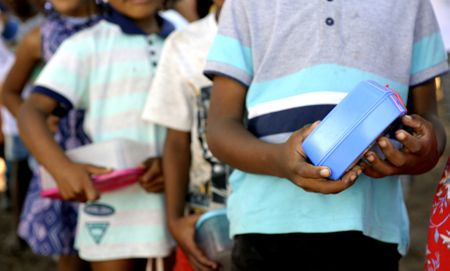 Community initiatives step up for children as holiday hunger bites