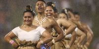 WOLLONGONG, AUSTRALIA - MARCH 24: Dancers performs ahead of the round three NRL match between the St George Illawarra Dragons and the Cronulla Sharks at WIN Stadium on March 24, 2022 in Wollongong, Australia. (Photo by Jason McCawley/Getty Images)