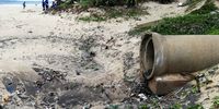 eThekwini Municipality clean-up crews attempt to tackle waste pouring out of effluent and drainage pipes that discharge into the ocean. (Photo: Benita Enoch)