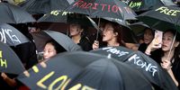 Tibetan Youth Congress (TYC) activists hold umbrellas and placards during the protest  to show their solidarity for the Hong Kong protest, in New Delhi, India, 30 August 2019. According to a press release,  Tibetan Youth Congress(TYC) activists organised a peace march to show their support for the Hong Kong protesters who are protesting since June 2019 over a now-suspended extradition bill that have morphed into an anti-government movement with no end in sight. EPA-EFE/HARISH TYAGI