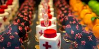 PRAGUE, CZECH REPUBLIC - MARCH 19: Desserts in a shape of a vaccine vial are placed in a window in cafe on March 19, 2021 in Prague, Czech Republic. A cafe in Prague, which first made a coronavirus-shaped cake in autumn last year, is now offering a strawberry-banana flavored dessert in the shape of a vaccine. The Czech Republic is currently conducting its vaccination campaign with the Pfizer/BioNTech, Oxford/AstraZeneca and Moderna vaccines. With a population of 10.7 million and about 1.4 million coronavirus cases to date, the Czech Republic has the highest per capita infection rate in the world. (Photo by Gabriel Kuchta/Getty Images)