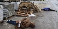 epa09868544 Bodies of Ukrainian civilians killed in the Russian invasion lie on a street in the small city of Bucha of Kyiv (Kiev) area, Ukraine, 03 April 2022. Some cities and villages had recently been recaptured by the Ukrainian army from Russian forces. On 24 February, Russian troops had entered Ukrainian territory in what the Russian president declared a 'special military operation', resulting in fighting and destruction in the country, a huge flow of refugees, and multiple sanctions against Russia.  EPA-EFE/MIKHAIL PALINCHAK ATTENTION: GRAPHIC CONTENT
