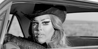These portraits were taken just before the pandemic reached the USA in February 2020. Drag Queen Cowboys is a collaboration with the vibrant community of performers based in Las Vegas. Set in Nevada, and inspired by the locations and displacement of characters in John Houston’s film The Misfits (1961), all drag queens chose and painstakingly made their own ‘Western’ outfits; including accessories, wigs and applying their own make-up. After gaining their trust, I steered them away from their nocturnal habitat of bars and clubs. With no artificial lighting or digital technology, I shot these portraits on black-and-white film, using a plate camera, in the natural light of the American West. © Jane Hilton, United Kingdom, Finalist, Professional, Portraiture, 2021 Sony World Photography Awards