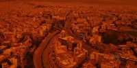 A general view as dust from the desert of Sahara covers the city of Athens on April 23, 2024 in Athens, Greece. (Photo by Milos Bicanski/Getty Images)