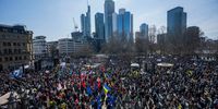 FRANKFURT, GERMANY - MARCH 13: People protesting against the ongoing war in Ukraine gather on March 13, 2022 in Frankfurt, Germany. Protesters are taking to the streets in major cities across Germany today to voice their anger over the Russian military invasion of Ukraine, which began February 24 and is leading to a growing humanitarian crisis. (Photo by Thomas Lohnes/Getty Images)