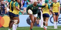 Aphiwe Ngwevu of South Africa  celebrates scoring her team’s eighth try against Brazil. (Photo: Paul Harding / Getty Images)