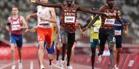 TOKYO, JAPAN - AUGUST 04: Emmanuel Kipkurui Korir of Team Kenya celebrates winning the gold medal alongside silver medal winner Ferguson Cheruiyot Rotich of Team Kenya as they cross the finish line in the Men's 800m Final on day twelve of the Tokyo 2020 Olympic Games at Olympic Stadium on August 04, 2021 in Tokyo, Japan. (Photo by Cameron Spencer/Getty Images)